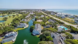 130 Salter Path Road Q83, Pine Knoll Shores, NC 28512 – photo 10: 52-web-or-mls-DJI_20250904112241_0003_D