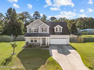 106 Norine Drive, Holly Ridge, NC 28445 – photo 1: DJI_20251018111820_0288_D