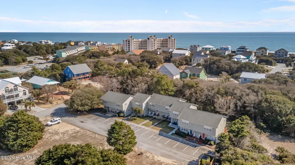 8815 Krystal Court 3, Emerald Isle, NC 28594 – photo 1 of 18: 43-web-or-mls-DJI_20260301140412_0322_D