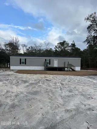 675 Pelican Roost Drive SW, Supply, NC 28462 — 3-bedroom manufactured home in Pelican Roost, Supply, NC, photo 1 of 6: 1_beyc69b1b09068be1