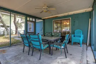 209 NE 56th Street, Oak Island, NC 28465 – photo 4: 07-Final 209 NE 56th St OKI-RJREM-9374