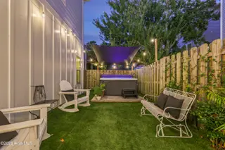 1225 Pinfish Lane, Carolina Beach, NC 28428 – photo 5: Backyard with hot tub
