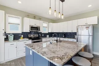 5205 E Pelican Drive, Oak Island, NC 28465 – photo 4: 24-web-or-mls-DSC06709