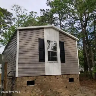 232 Lake Drive SW, Supply, NC 28462 — 3-bedroom manufactured home in Riverside, Supply, NC, photo 24 of 36: Street View