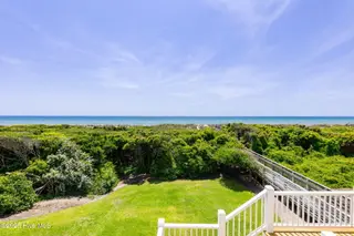 125 Roosevelt Drive, Pine Knoll Shores, NC 28512 — 5-bedroom home in Roosevelt Beach, Pine Knoll Shores, NC, photo 20 of 61: Beautiful ocean views off porch