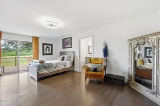 833 Pelican Drive, New Bern, NC 28560 – photo 17: Primary Bedroom with Deck Access