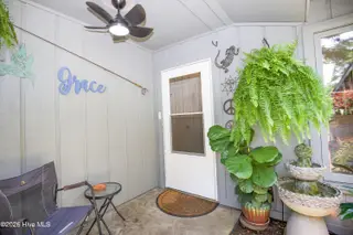 171 Cranes Cove, Vass, NC 28394 – photo 12: 06_Courtyard-Door-Ferns_171-Cranes-Cove
