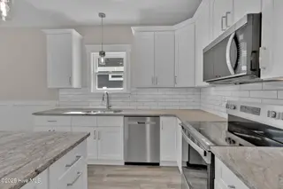 221 NE 75th Street, Oak Island, NC 28465 – photo 13: 221 NE 75th St-9