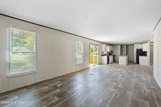 490 Orchard Lane SE, Bolivia, NC 28422 — 3-bedroom manufactured home in Vineyard Plantation, Bolivia, NC, photo 18 of 27: Family area