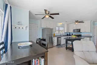 316 E Dolphin Drive, Oak Island, NC 28465 – photo 9: 316EDolphinDr - 19