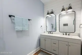 119 NE 27th Street, Oak Island, NC 28465 – photo 13: owners bath