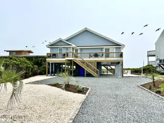 323 Caswell Beach Road, Oak Island, NC 28465 – photo 1: 323 Caswell Beach