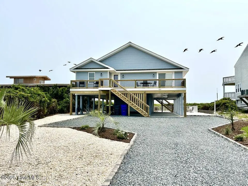 323 Caswell Beach Road, Oak Island, NC 28465 – photo 1 of 54: 323 Caswell Beach