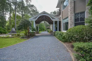 1064 Tresses Court, Vass, NC 28394 – photo 4: Porte-cochere/Driveway