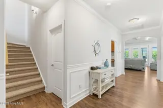 4054 Druids Glen Drive, Leland, NC 28451 – photo 7: Stairway to 3rd Bedroom & Full Bath
