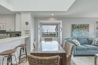 2111 W Fort Macon Road 313 Dunescape, Atlantic Beach, NC 28512 – photo 9: Dining area with ample natural light