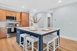 137 NE 3rd Street, Oak Island, NC 28465 – photo 5: Kitchen Island