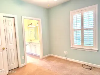 172 Clubhouse Road Apt 1, Sunset Beach, NC 28468 – photo 17: Guest room 1