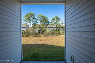 218 Sandpiper Place, Holly Ridge, NC 28445 – photo 5: 218 Sand Piper - Exterior - Edited-3