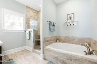 6479 Bryson Drive SW, Ocean Isle Beach, NC 28469 – photo 21: Soaking tub/walk-in shower