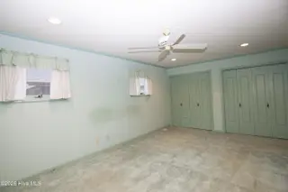 119 Pine Lake Drive, Whispering Pines, NC 28327 – photo 16: Master Bedroom