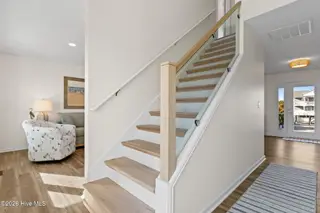 1116 E Beach Drive, Oak Island, NC 28465 – photo 19: Staircase