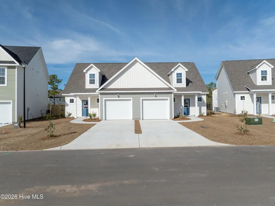 212 Sandpiper Place, Holly Ridge, NC 28445 – photo 1 of 26: 212-214 Sandpiper - Exterior - Edited_10