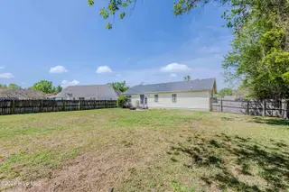 126 Forest Bluff Drive, Jacksonville, NC 28540 — 3-bedroom home in River Hills, Jacksonville, NC, photo 19 of 22: Backyard