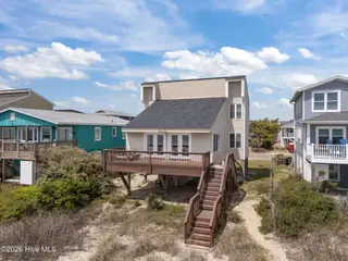 3909 W Beach Drive, Oak Island, NC 28465 – photo 11: 12-web-or-mls-DJI_20260408140419_0419_D