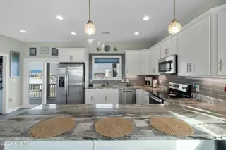 318 N Topsail Drive, Surf City, NC 28445 – photo 4: tempImage0qD3cL