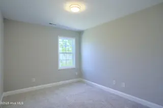 218 Sandpiper Place, Holly Ridge, NC 28445 – photo 14: 218 Sand Piper - Exterior - Edited_6