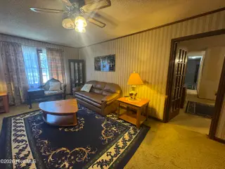 691 Harris Creek Road, Jacksonville, NC 28540 — 3-bedroom home, Jacksonville, NC, photo 21 of 41: family room