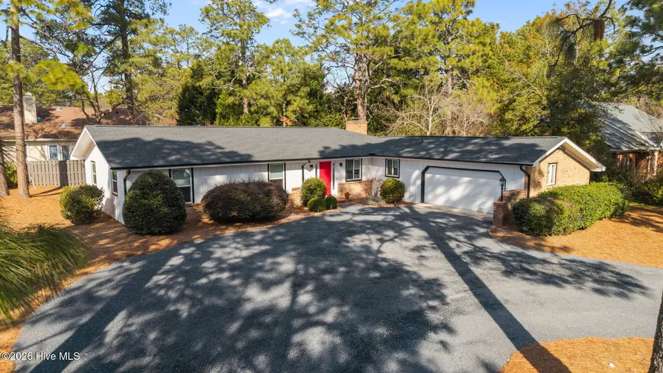1425 Monticello Drive, Pinehurst, NC 28374 – photo 1 of 46: 1-web-or-mls-DJI_20260128105951_0483_D