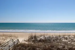 1509 Ocean Drive West, Emerald Isle, NC 28594 — 4-bedroom townhome in Emerald Isle By The Sea, Emerald Isle, NC, photo 22 of 26: 2 Seas the Day West 031 king balcony