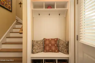 307 Stella Bridgeway Drive, Stella, NC 28582 – photo 4: built-in mudroom bench