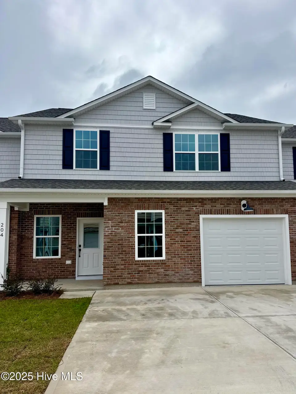 204 Triton Lane, Surf City, NC 28445 – photo 1 of 22: Home Front