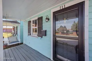 711 Queen Street, New Bern, NC 28560 – photo 18: Adorable Front Porch Swing
