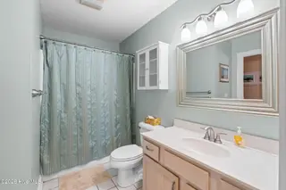 908 Resort Circle Unit 512, Sunset Beach, NC 28468 — 2-bedroom condo in Colony II, Sunset Beach, NC, photo 22 of 39: Primary Bathroom