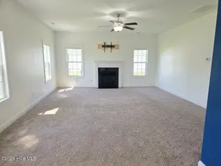 2007 Snapper Street, New Bern, NC 28562 — 4-bedroom home in Bluewater Rise, New Bern, NC, photo 5 of 31: 5 Large Living Room w Fireplace