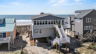 5127 W Beach Drive, Oak Island, NC 28465 – photo 5: 70_drone