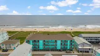 418 Carolina Beach Avenue N Unit 3b, Carolina Beach, NC 28428 – photo 1: 41-web-or-mls-GI - 418 Carolina Beach Av