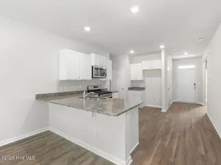 3019 Maravella Court SE Lot 40, Bolivia, NC 28422 — 3-bedroom home in Mariner's Reach, Bolivia, NC, photo 7 of 42: WindyWoods1723kitDRHorton-007-024-1280x9
