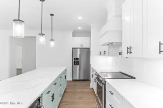 322 NE 50th Street, Oak Island, NC 28465 – photo 16: 015_322_ne-15_954