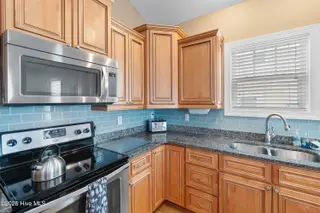 1634 E Dolphin Drive, Oak Island, NC 28465 – photo 21: 1634EDolphinDr - 31