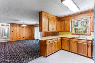 325 Lupin Place, Southern Pines, NC 28387 – photo 8: Kitchen to Family Room