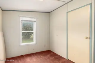 100 Lindsey Court, Beaufort, NC 28516 — 3-bedroom manufactured home in Green Meadows, Beaufort, NC, photo 14 of 38: Bedroom 3