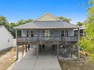 133 NE 3rd Street, Oak Island, NC 28465 – photo 1: 133 NE 3rd St