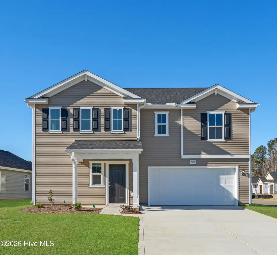 7002 Seaside Palms Place SW, Sunset Beach, NC 28468 – photo 1 of 37: Wayfare_7002 Seaside Palms PL_Lot 61