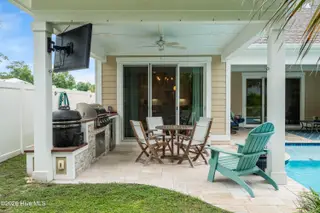 1620 Harbour Place Drive, Calabash, NC 28467 – photo 11: Backyard Lanai