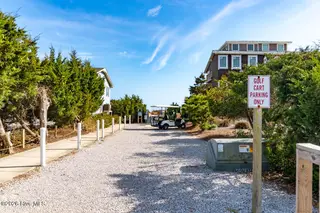 112 James Drive, Emerald Isle, NC 28594 – photo 4: Walkway & Golfcart Parking